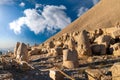 Kahta, Adiyaman, Turkey - September 14 2020: Commagene statue ruins on top of Nemrut Mountain with blue sky. Stone heads at the Royalty Free Stock Photo