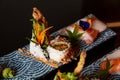 Kaiseki sushi platter combo set on the serving board in the fine dining Japanese restaurant