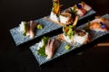 Kaiseki sushi platter combo set on the serving board in the fine dining Japanese restaurant