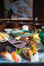 Kaiseki sushi platter combo set on the serving board in the fine dining Japanese restaurant