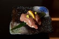 Kaiseki sushi platter combo set on the serving board in the fine dining Japanese restaurant