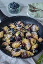 Kaiserschmarrn - traditional austrian pancake dessert with blueberries Royalty Free Stock Photo