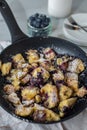 Kaiserschmarrn - traditional austrian pancake dessert with blueberries Royalty Free Stock Photo