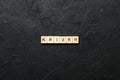 kaizen word written on wood block. kaizen text on table, concept