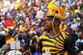 A Kaizer Chiefs fan wearing a makarapa hat watches the match in anticipation Royalty Free Stock Photo