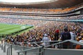 Kaizer Chiefs verses Orlando Pirates: Fans packed into the FNB Stadium in Soweto Royalty Free Stock Photo