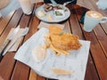 Fish and chips on the plate at the Koffie Lake cafe Royalty Free Stock Photo