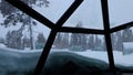 Glass igloo covered with snow, Kakslauttanen, Finland Royalty Free Stock Photo
