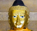 Kakusandha buddha image covered with foilgold Royalty Free Stock Photo