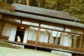 Meiji Jingu`s Kakuuntei Teahouse with a tea cermony inside and traditional Japanese women.