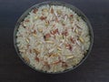 Kalakand an Indian form of cheesecake made from sweetened milk with chopped nuts and, sometimes, saffron and edible silver foil.
