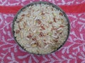 Kalakand an Indian form of cheesecake made from sweetened milk with chopped nuts and, sometimes, saffron and edible silver foil.