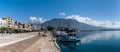 Panorama view of the waterfront and harbor in Kalamata with many boats moored on the harbor wall Royalty Free Stock Photo