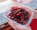 Kalamata or Kalamon purple Greek olives contained in a plastic tray