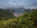 Panoramic view of Mount Meteor and the religious monastery of Greece with unusual clouds in the sky Royalty Free Stock Photo