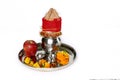Kalash with coconut and chunni and pooja thali with diya for navratri pooja