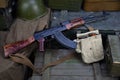 Kalashnikov AK 47 with ammunitions on army box background