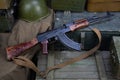 Kalashnikov AK 47 with ammunitions on army box background