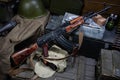 Kalashnikov AK 47 with ammunitions on army box background