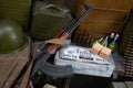 Kalashnikov AK 47 with ammunitions on army box background