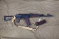 Kalashnikov AK 74 with ammunitions on canvas