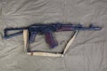 Kalashnikov AK 74 with ammunitions on canvas