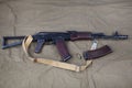 Kalashnikov AK 74 with ammunitions on canvas