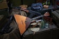 Kalashnikov AK 47 with ammunitions and vodka on army box background Royalty Free Stock Photo