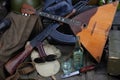 Kalashnikov AK 47 with ammunitions, vodka and balalaika on army box background Royalty Free Stock Photo