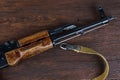 Kalashnikov ak 47 gun on wooden background Royalty Free Stock Photo