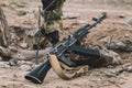 A Kalashnikov assault rifle is lying on ground. The concept of war Royalty Free Stock Photo