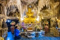 Kalasin, Thailand, February 1, 2023. Buddhists worship Buddha images at Wat Phu Dan Hai. Kuchinarai District, Kalasin Province,