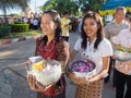 Kalasin, Thailand - January 1: A lot of people give alms to a bu