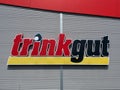 Close up of isolated logo and lettering of german beverage market trinkgut