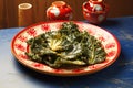 kale chips on a colorful ceramic plate, natural light