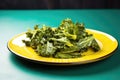 kale chips on a colorful ceramic plate, natural light