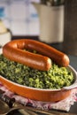 Kale with smoked sausage or 'Boerenkool met worst' Royalty Free Stock Photo