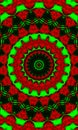 Kaleidoscope In Christmas Colors Of Red And Green. Happy Christmas 2022 Pattern. Vertical Image