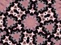 Kaleidoscope pattern with embroidered flower-shaped and rhombus figures in soft purple and black Royalty Free Stock Photo