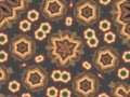 Kaleidoscope pattern with flower-shaped figures in brown color