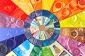 Kaleidoscopic of different currencies from around the world. Visually striking composition symbolize the global nature Royalty Free Stock Photo