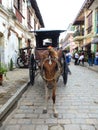 A Kalesa or Horse Carriage in Historic Town of Vigan. Royalty Free Stock Photo