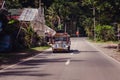 A modified bus on a road in Kalibo