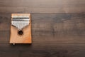 Kalimba on the wooden background