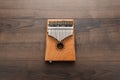 Kalimba on the wooden background