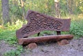 KALININGRAD REGION, RUSSIA. Wooden decorative carved bench on the territory of the Visitor Center `Museum Complex of the Curonian