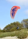 KALININGRAD REGION, RUSSIA. Flight of a paraplane in the sky over Curonian Spit Royalty Free Stock Photo