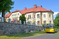 KALININGRAD REGION, RUSSIA. Detail of a high school building formerly Lauken Castle and a school bus. Settlement Saranskoe