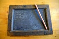 KALININGRAD REGION, RUSSIA. Pencil and griffin board with recorded example. Museum `Old German School Waldwinkel.` Village Ilyiche