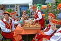 KALININGRAD REGION, RUSSIA. Participants of the Belarusian national folklore ensemble have tea on an agricultural holiday